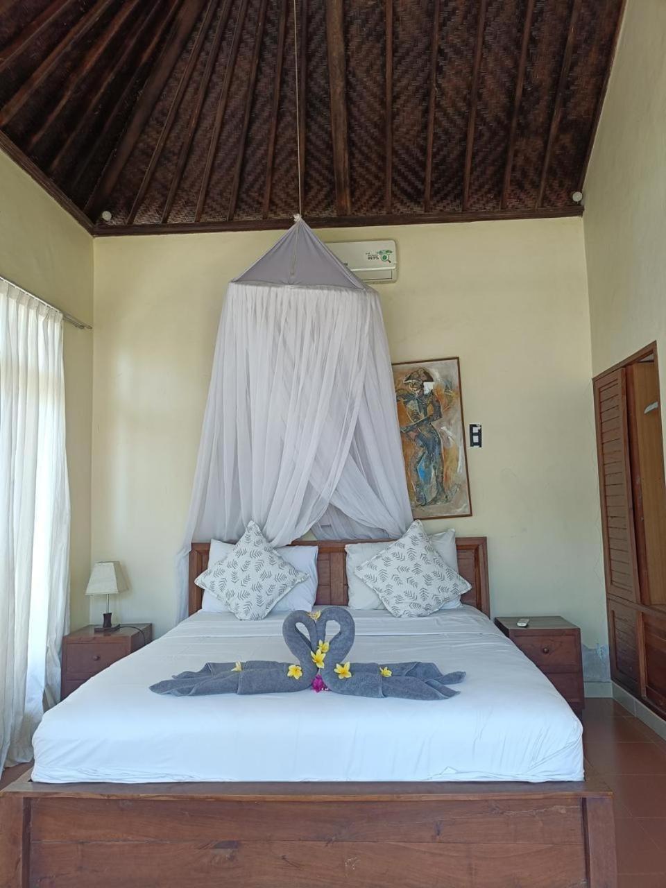Putra'Lebah Amed Guest House Buitenkant foto